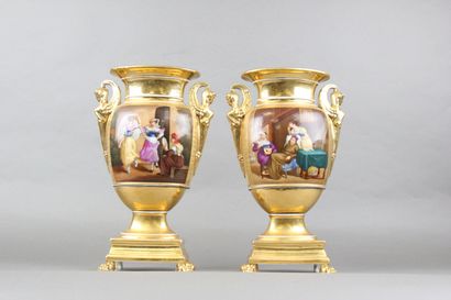 Pair of polychrome porcelain vases

Painted...