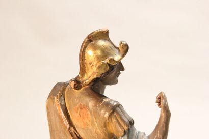 Antique soldier in armor.

Subject in polychromed...
