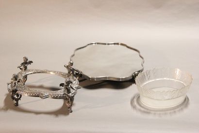 Table top in silver plated metal in two parts.

The...