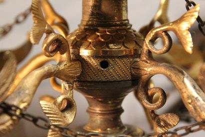 Small chandelier in gilded and chased bronze.

With...