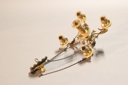 Small chandelier in gilded and chased bronze.

With...