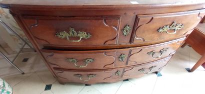 Molded walnut chest of drawers of slightly...