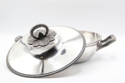 Silver covered vegetable dish.

Body and...