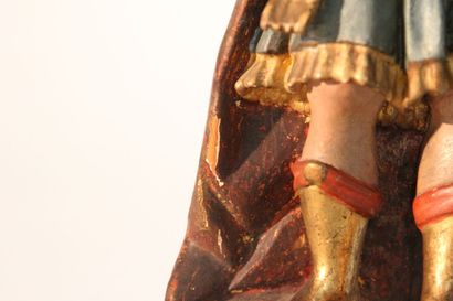 Antique soldier in armor.

Subject in polychromed...