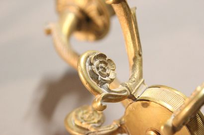 Pair of sconces with four lights in chased...