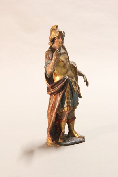 Antique soldier in armor.

Subject in polychromed...