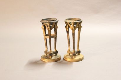 
Pair of gilt bronze cups supported by sphinxes...