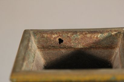 Pair of flared planters in polychrome sheet...