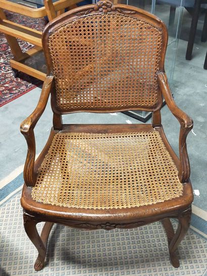Armchair in natural wood molded and carved...