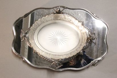 Table top in silver plated metal in two parts.

The...
