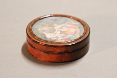 Small circular box in tortoiseshell and burr...
