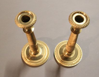 Pair of ormolu and chased bronze torches....