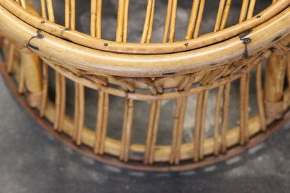 Pair of rattan armchairs.

The openwork back.

Circular...