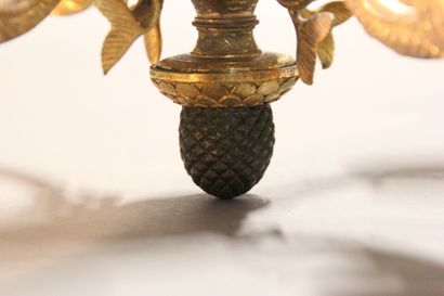 Small chandelier in gilded and chased bronze.

With...