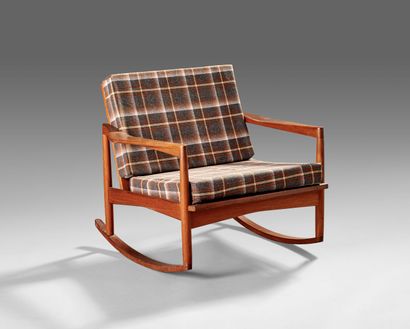 Teak rocking chair.

Flat armrests.

Striped...