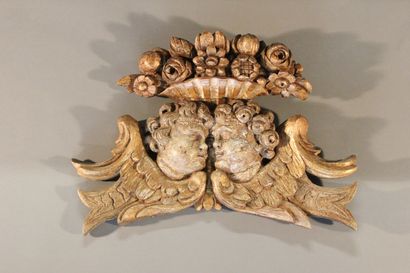 Decorative element in carved gilded wood...