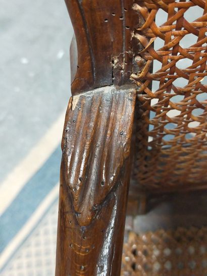 Armchair in natural wood molded and carved...
