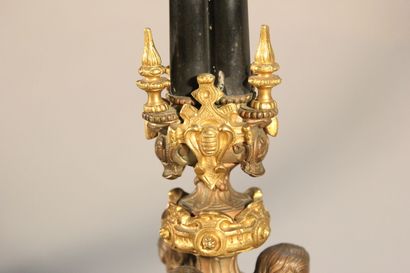 Pair of bronze and black marble candlesticks...