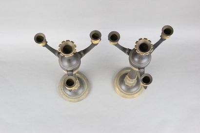 Pair of candelabras with four lights in chased,...