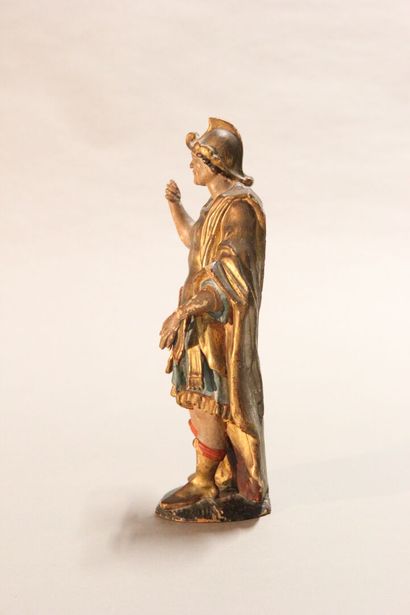 Antique soldier in armor.

Subject in polychromed...