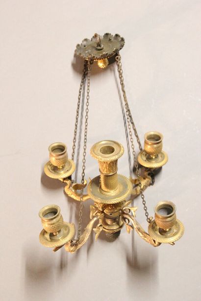 Small chandelier in gilded and chased bronze.

With...