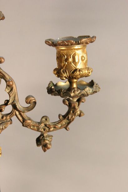 Pair of bronze and black marble candlesticks...