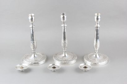 Suite of three candlesticks in silver plated...