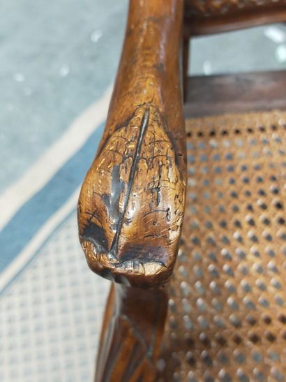 Armchair in natural wood molded and carved...