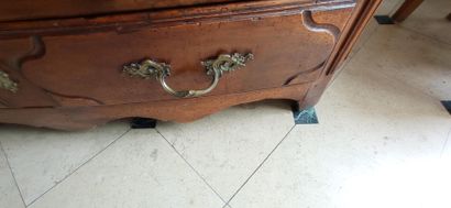 Molded walnut chest of drawers of slightly...