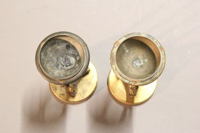 
Pair of gilt bronze cups supported by sphinxes...