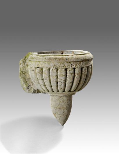 Marble stone stoup of circular shape

Decorated...