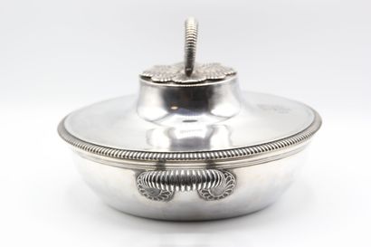 Silver covered vegetable dish.

Body and...
