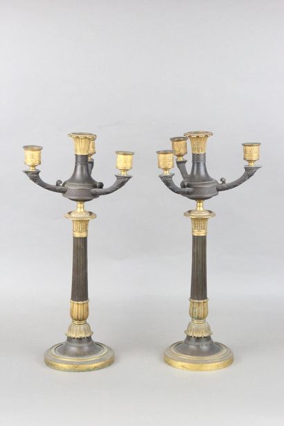 Pair of candelabras with four lights in chased,...