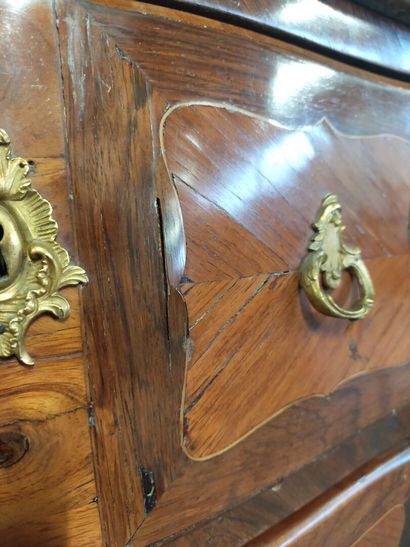 Chest of drawers with a slight curve. 

Rosewood...