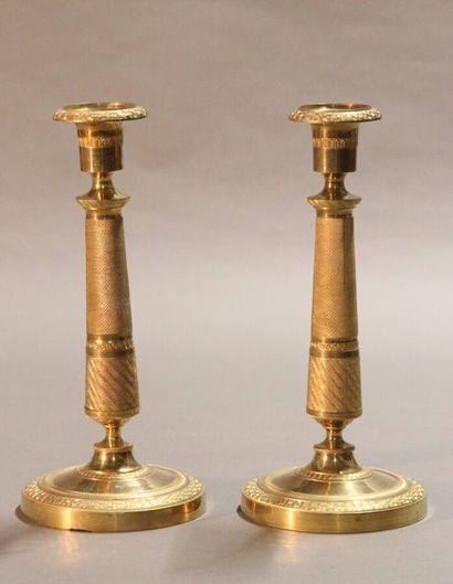 Pair of ormolu and chased bronze torches....