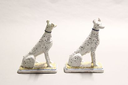 Pair of seated dalmatians in polychrome earthenware.

Rectangular...