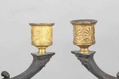 Pair of candelabras with four lights in chased,...