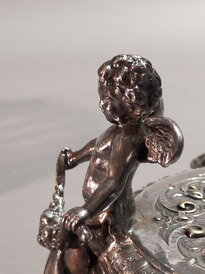 Table top in silver plated metal in two parts.

The...