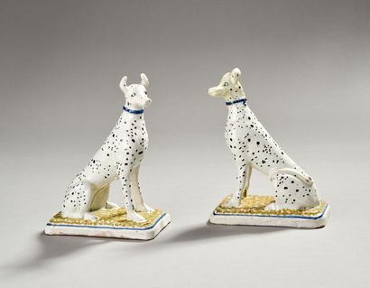 Pair of seated dalmatians in polychrome earthenware.

Rectangular...