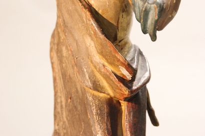 Antique soldier in armor.

Subject in polychromed...