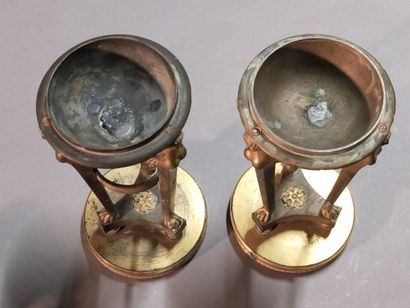 
Pair of gilt bronze cups supported by sphinxes...