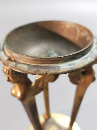 
Pair of gilt bronze cups supported by sphinxes...