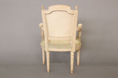 Child's armchair in carved wood and rechambered...