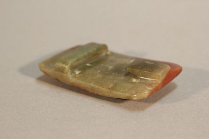 CHINA

Rust and spinach jade belt buckle.

Incised...
