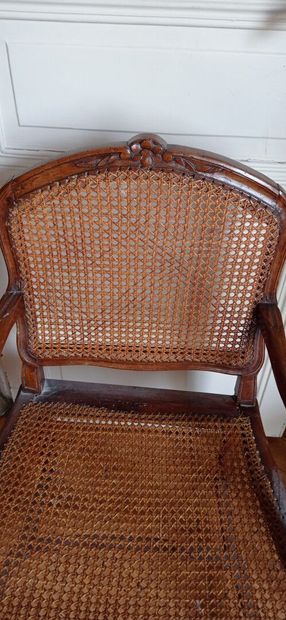 Armchair in natural wood molded and carved...