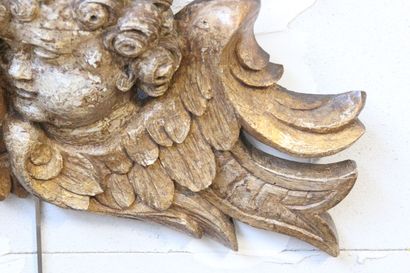 Decorative element in carved gilded wood...