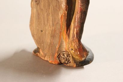 Antique soldier in armor.

Subject in polychromed...