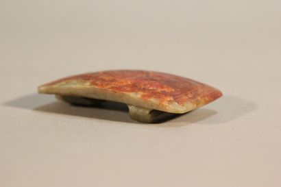 CHINA

Rust and spinach jade belt buckle.

Incised...