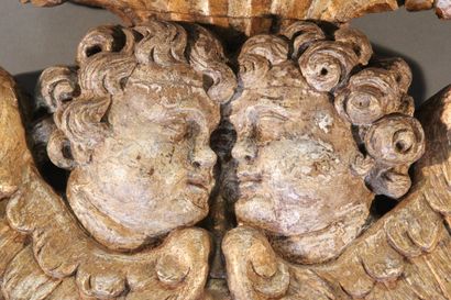 Decorative element in carved gilded wood...