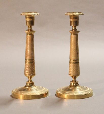 Pair of ormolu and chased bronze torches....